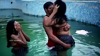 A Man Engages In A Threesome With His Spouse And A Friend In A Pool