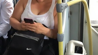 Milf With Big Breasts Rides The Bus And Bounces Her Tits